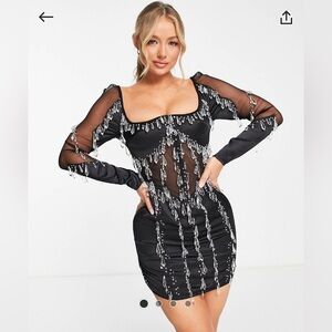 Long sleeve teardrop embellished mini dress with mesh panels in black